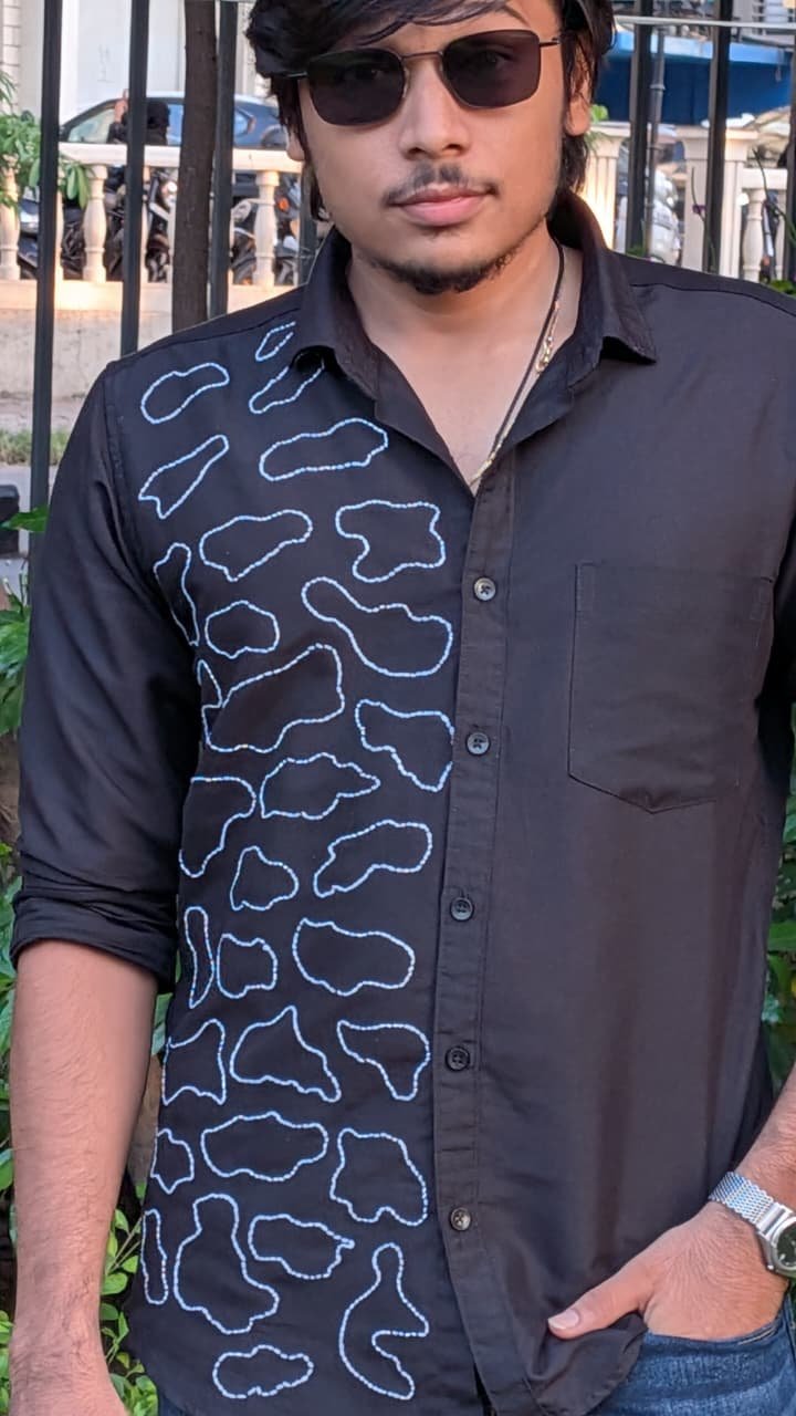Detailed fit view of Cloud Design running stitch shirt